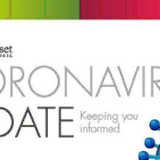 North Somerset Council coronavirus update banner with virus graphic and colourful header.